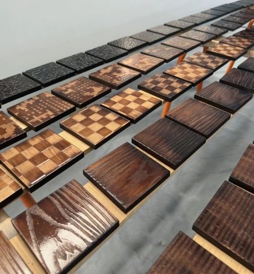 M-Bossed Design Show 2026 booth featuring all six signature embossed patterns